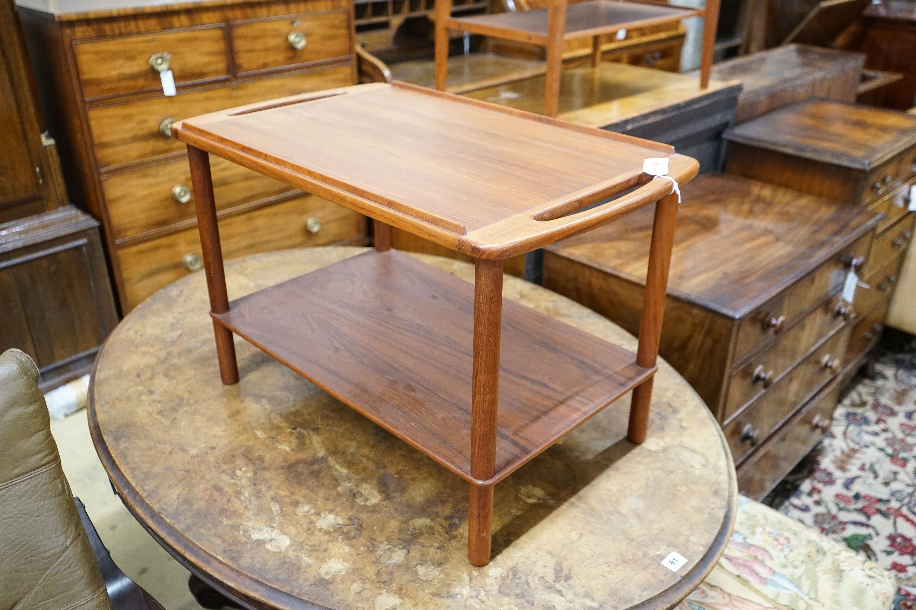 A mid century design Danish style teak two-tier occasional table, width 74cm, depth 44cm, height 48cm
